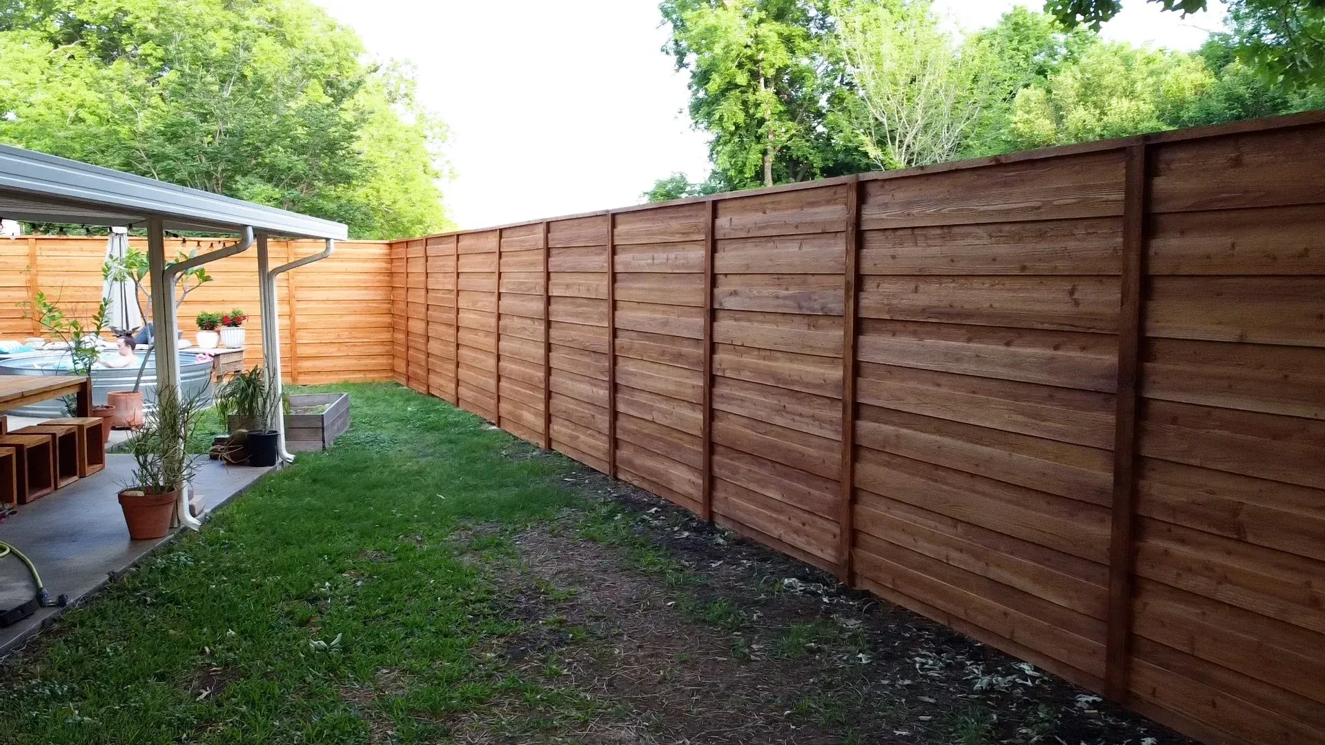 Cedar privacy fence installation at Austin residential property
